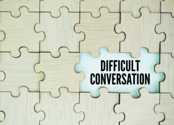 Puzzle with missing piece that says 'difficult conversation'