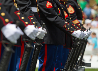 US Military service men standing in formation.